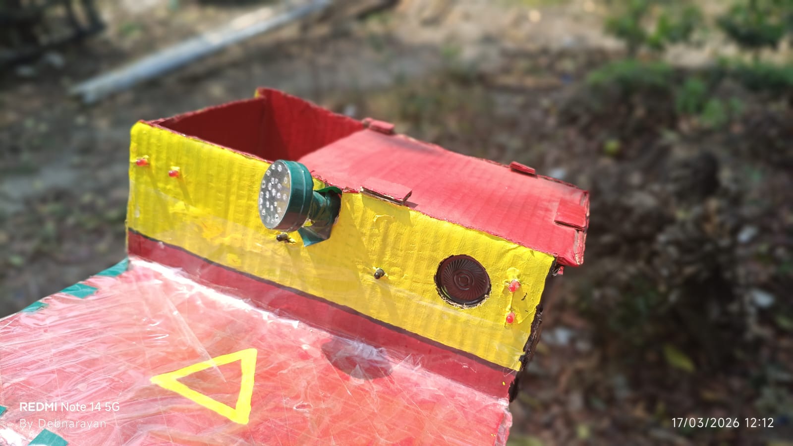 Three-quarter view of fire detector model